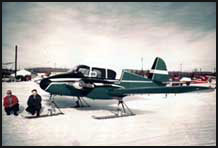 Photo of Apache airplane on skis